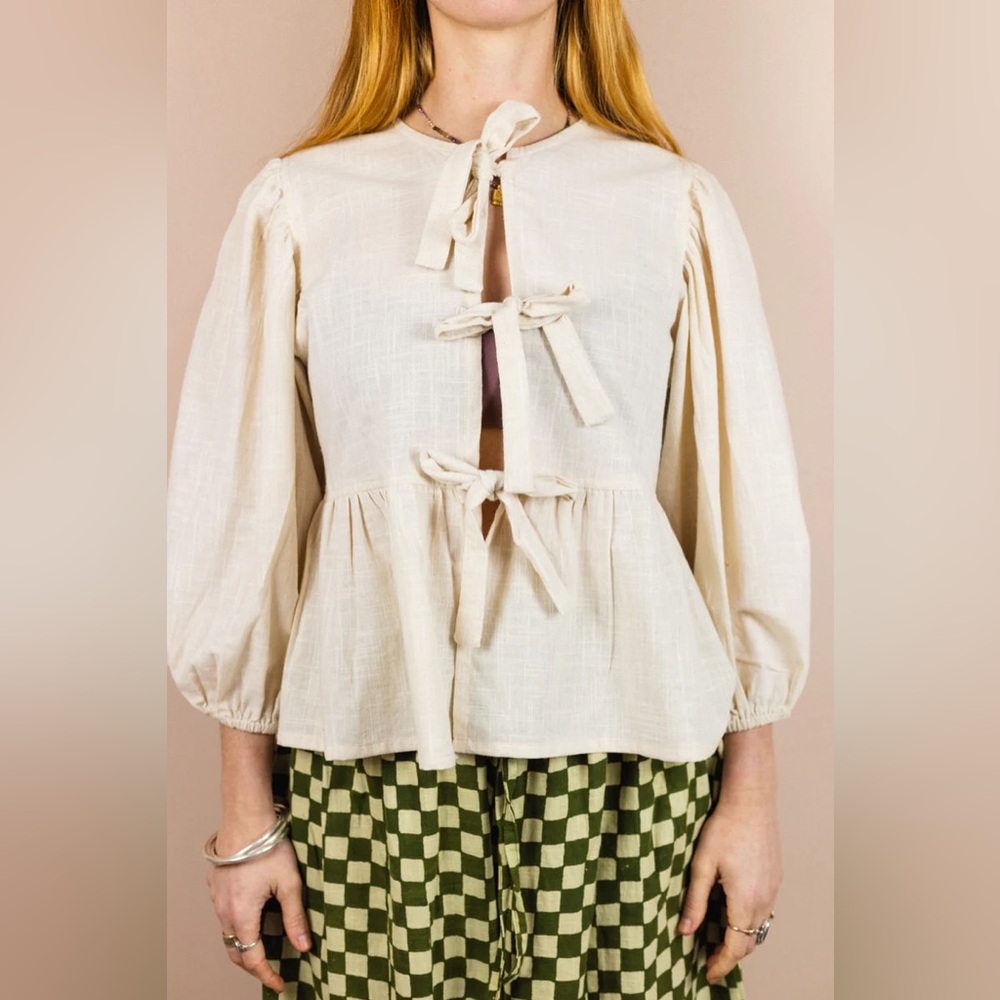 Cream Tie-Front Peplum Blouse